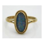 A 9ct gold ring set with black opal doublet, 1.7g, size M