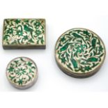 Three white metal boxes with guilloche enamelling, largest 63mm wide, 110g