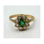 A 9ct gold ring set with white stones & emerald, 3.3g, size R/S