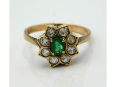 A 9ct gold ring set with white stones & emerald, 3.3g, size R/S