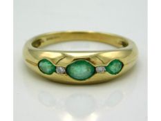 A 9ct gold ring set with emerald & diamond, 2.4g, size P/Q