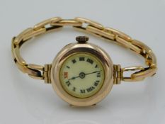 A ladies 9ct gold watch & strap, 17.3g inclusive
