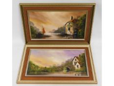 A pair of framed landscape oil paintings featuring