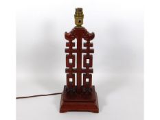 A decorative Chinese style hardwood lamp, 14.5in t