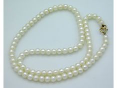 A set of cultured pearls with a 9ct gold clasp, 16