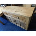 A pine farmhouse dresser base with two drawers & c