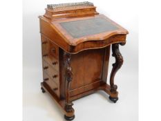 A mid Victorian walnut Davenport desk, 33.375in hi