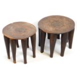 Two c.1900 African carved eight legged Nupe stools