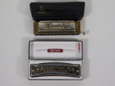 A cased Hohner harmonica 260 & an Unsere Lieblinge
