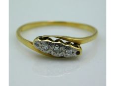 An 18ct gold ring set with small diamonds, lacking