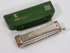 A cased Hohner harmonica 270 Super Chromonica, G K