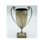 An antique Barton Silver trophy, inscribed "Presen