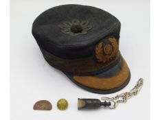 A vintage GWR Station Masters railway cap with GWR whistle, pay cheque tag & button