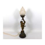 A figurative spelter lamp converted to electric, 1