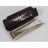 A cased Hohner Chromonica III 280 harmonica, C Key