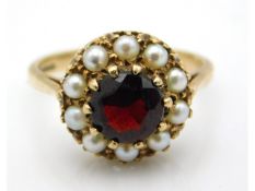 A 9ct gold garnet & pearl ring, size L, 3.4g