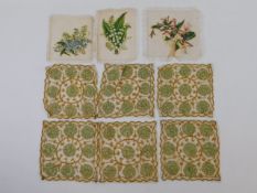 Six antique embroidered panels twinned with three