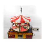 A Meccano merry-go-round with control panel, 59cm