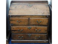 An 18thC. walnut bureau, some faults, 31.5in wide