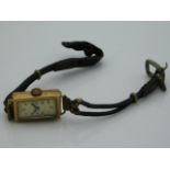 A ladies 9ct gold cased wristwatch