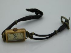 A ladies 9ct gold cased wristwatch