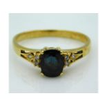 An 18ct gold sapphire & diamond ring, size N. 2.5g