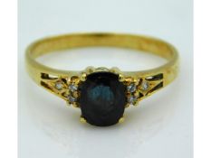 An 18ct gold sapphire & diamond ring, size N. 2.5g