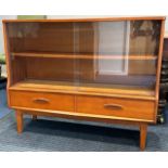 A teak G-Plan style retro bookcase with glass sliding doors & drawers