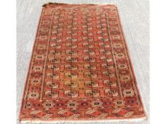 A Persian Turkaman style rug, approx. 1780mm x 124