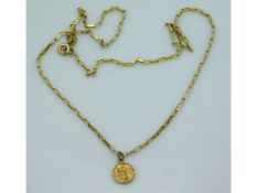 A 9ct gold chain & St. Christopher pendant, 15.75i