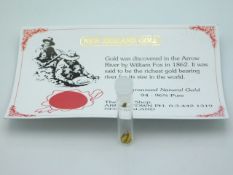 A novelty New Zealand pure gold sample with certif