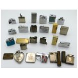 A collection of vintage lighters including a small