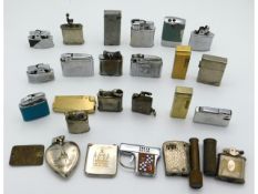 A collection of vintage lighters including a small