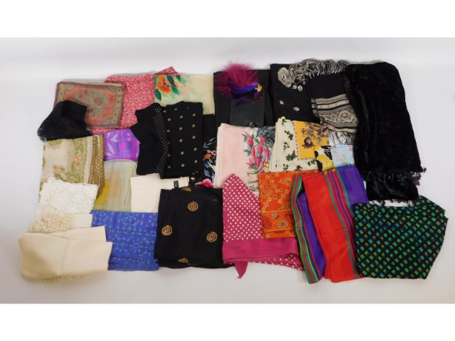 A selection of mostly silk scarves, some branded