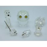 Six pieces of Swarovski crystal including owl, tal