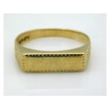 A 9ct gold ring inscribed "Rebecca", size R/S, 3.4