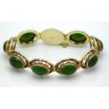 A silver gilt & jade bracelet, 7.75in long, 31.3g