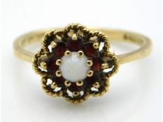 A 9ct gold opal & garnet ring, size N, 2g
