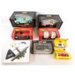 Four boxed Burago 1:18 & 1:24 scale diecast vehicl