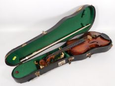 An antique violin with case & later bow, violin me