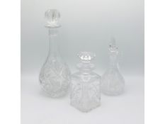 Two cut glass decanters & one water jug with stopp