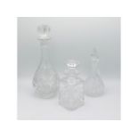 Two cut glass decanters & one water jug with stopp