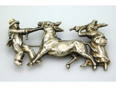 A silver (tested) brooch depicting an unwilling do