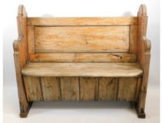 A 19thC. pine church pew, 44in wide