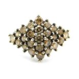 A 9ct gold champagne diamond cluster ring, size O,