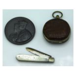 A King George VI bronze Coronation medal, a leathe