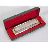 A cased Hohner harmonica 270 Super Chromonica, C K