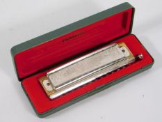 A cased Hohner harmonica 270 Super Chromonica, C K