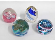 Four Caithness paperweights, tallest 3.5in