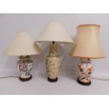 Three decorative Oriental ceramic lamps, tallest i